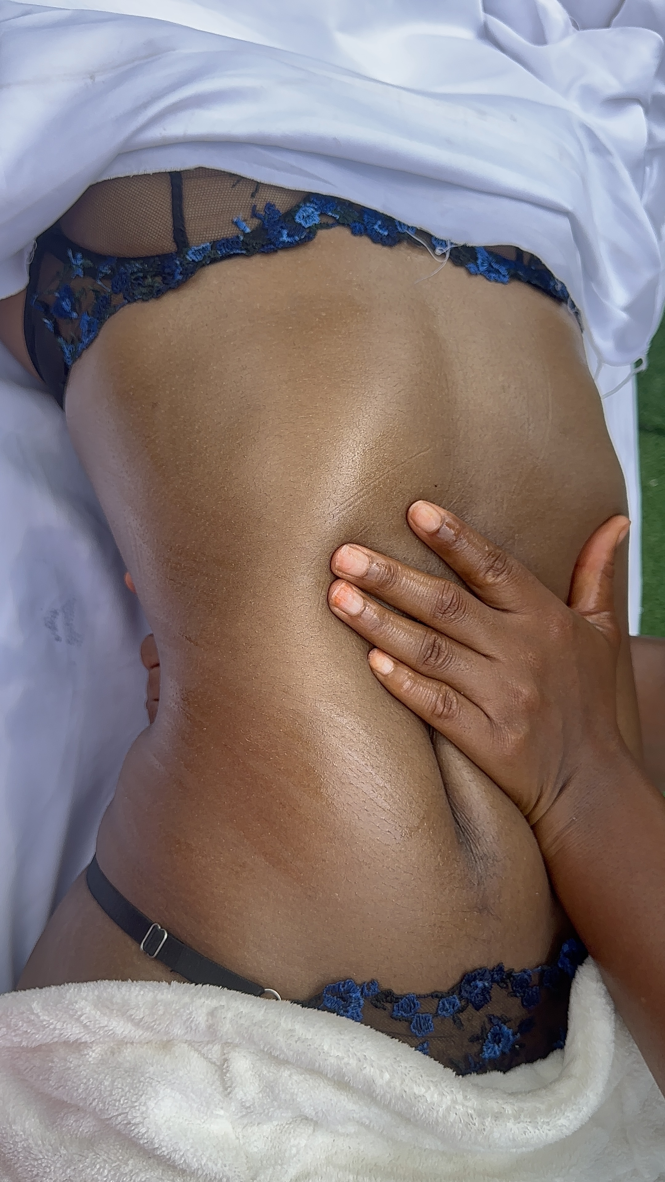 Therapist hands during a slow, attentive back massage